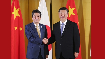 习近平分别会见日本首相安倍晋三、韩国总统文在寅