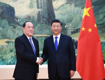习近平会见贺一诚