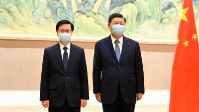 习近平会见李家超