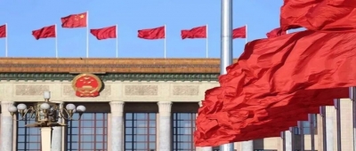 人民日报评论员：尊崇法治 厉行法治